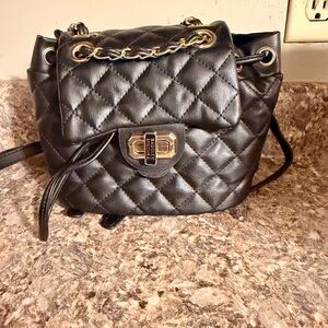 Badgley Mischka black quilted mini backpack. Brand new, never carried 🖤
